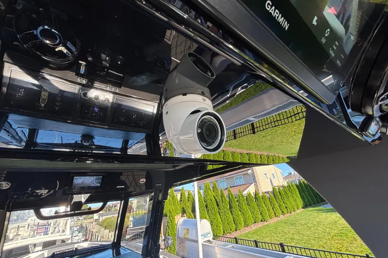 Slide: The Image of 2023 Fountain 38 SCX boat seats with gray and white diamond-patterned upholstery. - 42