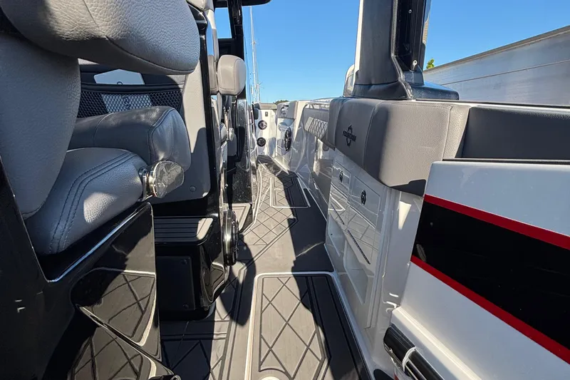 Slide: The Image of 2023 Fountain 38 SCX boat interior with sleek seating and modern design elements. - 48