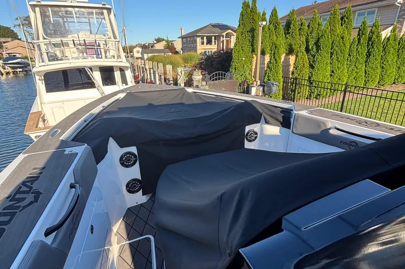 Slide: The Image of Interior of 2023 Fountain 38 SCX boat with advanced Garmin navigation system. - 53