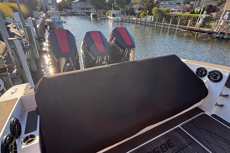 Slide: The Image of 2023 Fountain 38 SCX boat ladder compartment with stainless steel folding ladder. - 58