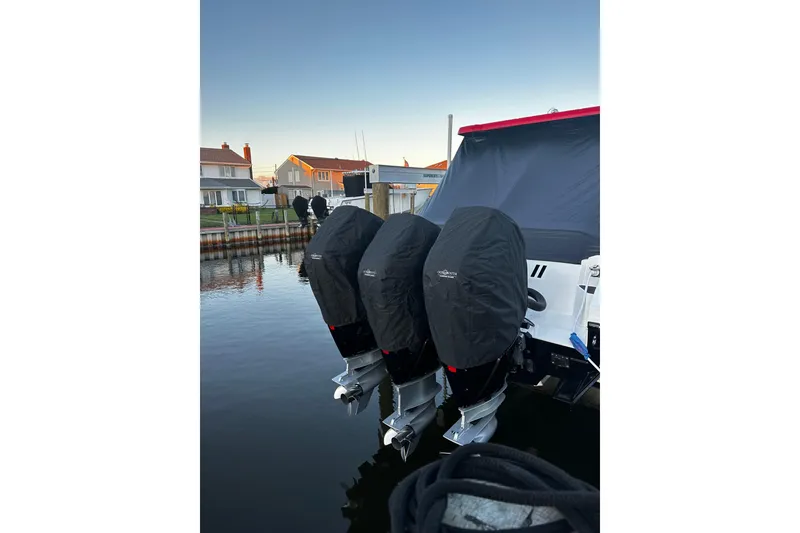 Slide: The Image of 2023 Fountain 38 SCX boat interior with sleek seating and modern design. - 59