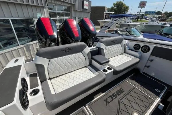 Slide: The Image of 2023 Fountain 38 SCX boat interior with covered seating and sleek design. - 67