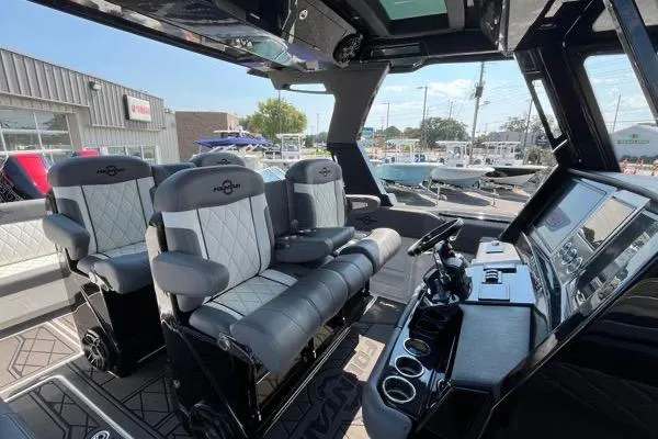 Slide: The Image of 2023 Fountain 38 SCX boat interior with sleek seating and modern design. - 71