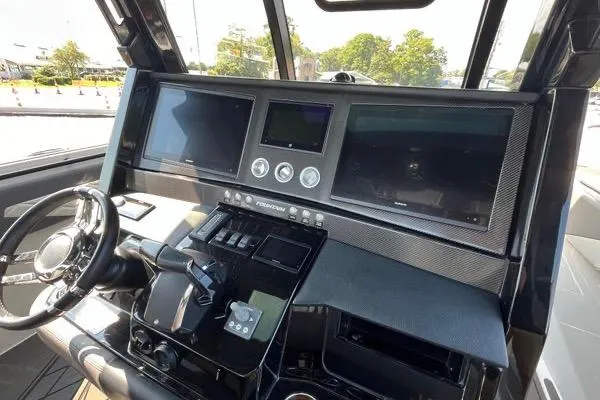 Slide: The Image of 2023 Fountain 38 SCX boat interior with luxurious seating and modern design. - 72