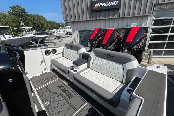 Slide: The Image of 2023 Fountain 38 SCX boat interior with seating and Mercury engines. - 85