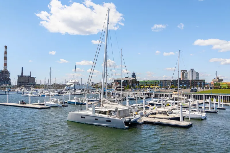 Slide: The Image of 2019 Itacatamarans 14.99 sailing on open sea under clear blue sky. - 11