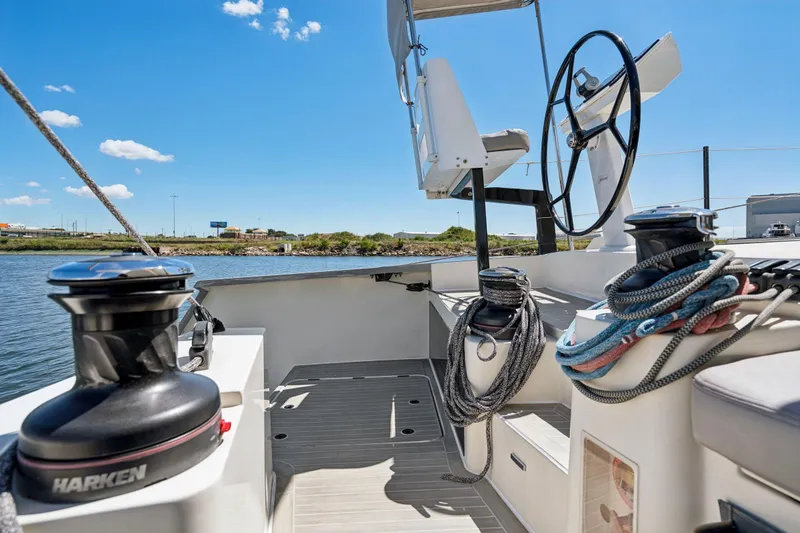 Slide: The Image of Luxurious cabin interior of 2019 Itacatamarans 14.99 with modern bedding and skylight. - 110