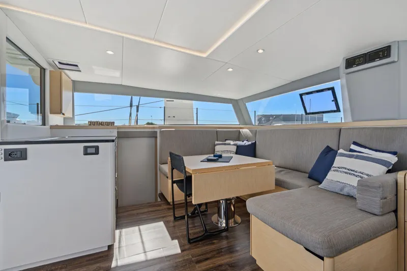 Slide: The Image of Modern cabin interior of 2019 Itacatamarans 14.99 with skylight and cozy bed. - 122