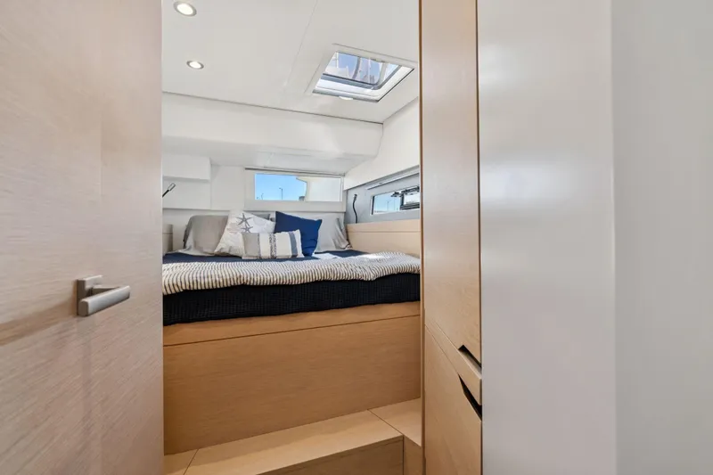 Slide: The Image of Cozy cabin interior of 2019 Itacatamarans 14.99 with skylight and modern design. - 124