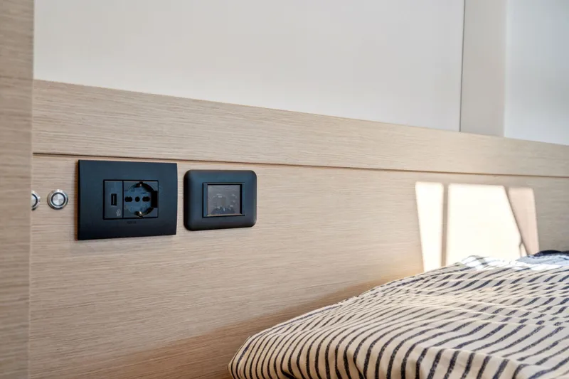 Slide: The Image of 2019 Itacatamarans 14.99 with Yamaha outboard motor docked at marina. - 131