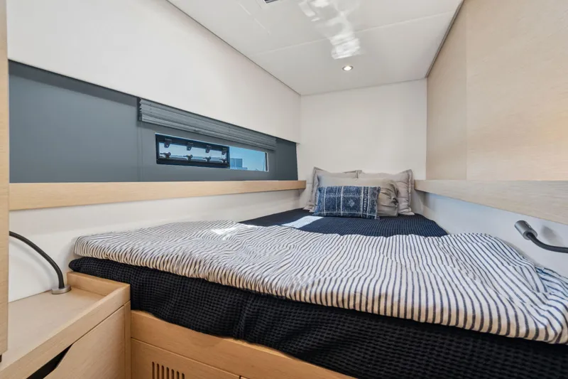 Slide: The Image of Yamaha 25 outboard motor on 2019 Itacatamarans 14.99, docked at marina. - 133