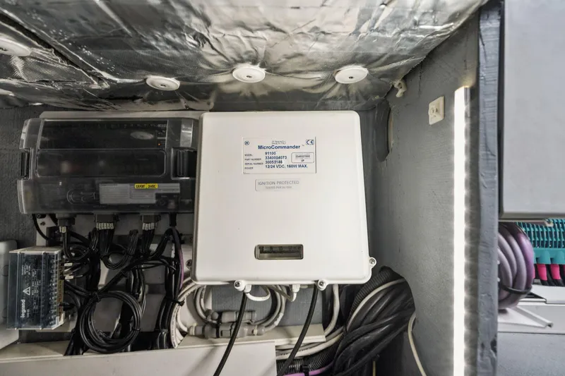 Slide: The Image of 2019 Itacatamarans 14.99 catamaran docked at marina under clear blue sky. - 142