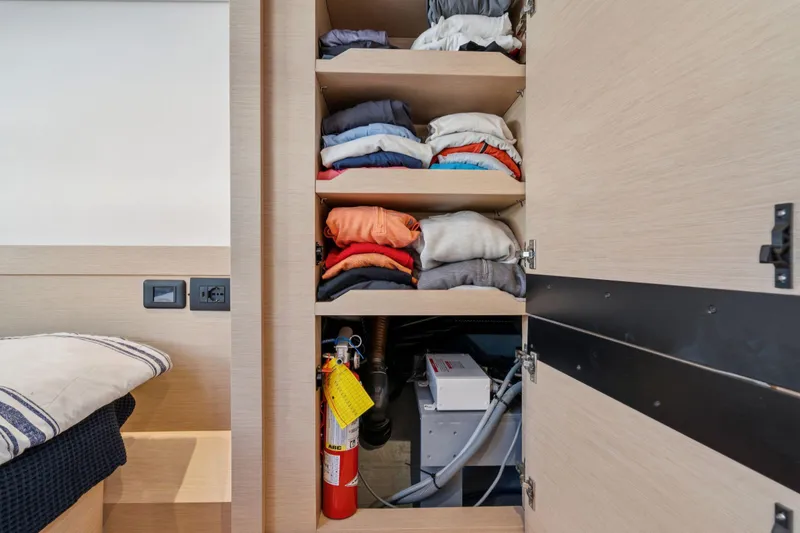 Slide: The Image of Storage area on 2019 Itacatamarans 14.99 with ropes and fenders. - 151