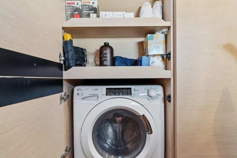 Slide: The Image of 2019 Itacatamarans 14.99 yacht deck with open hatches at marina. - 157