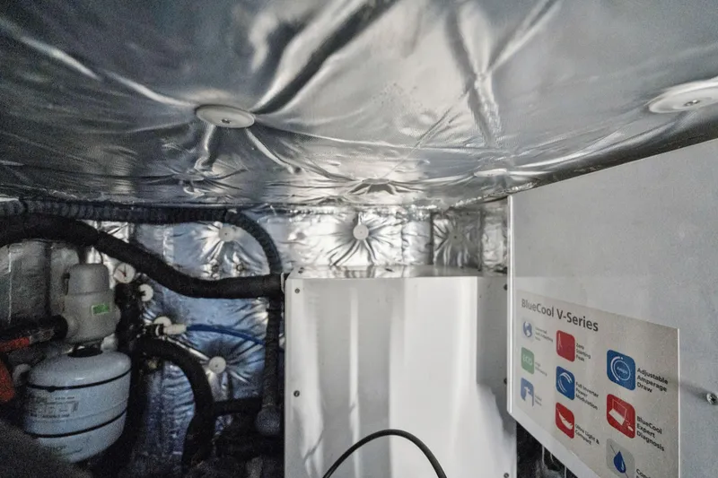 Slide: The Image of Engine room of 2019 Itacatamarans 14.99 with ladder and equipment. - 163