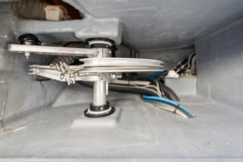 Slide: The Image of Open hatch on 2019 Itacatamarans 14.99 catamaran, showcasing storage compartment and ropes. - 173