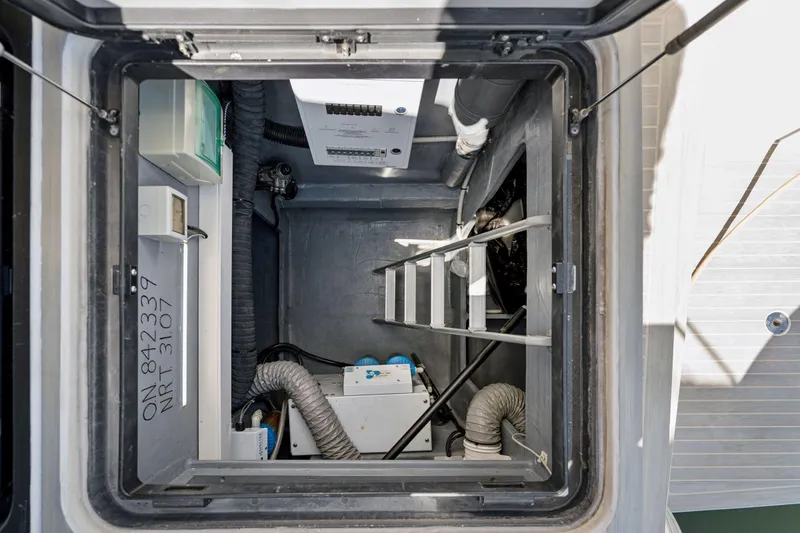 Slide: The Image of Engine room of 2019 Itacatamarans 14.99, featuring complex wiring and insulation. - 177