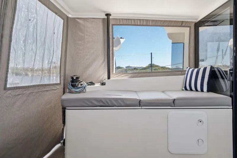 Slide: The Image of Electrical system inside 2019 Itacatamarans 14.99, featuring wiring and control panels. - 180