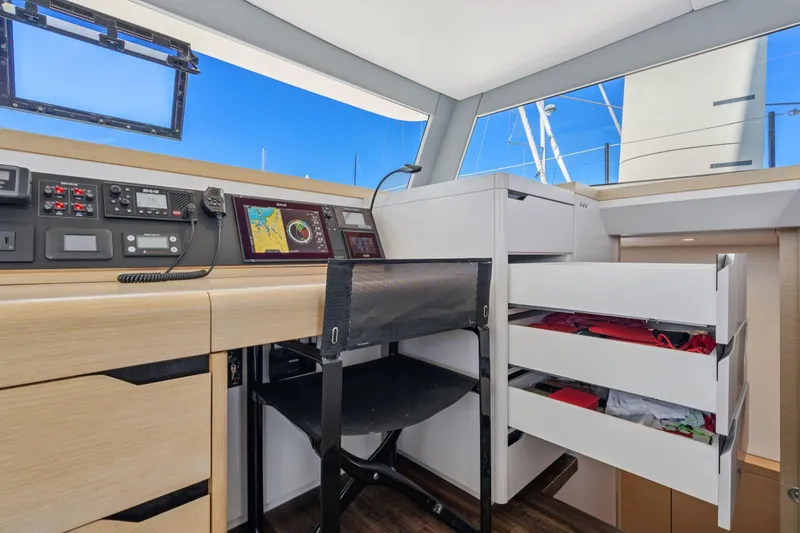 Slide: The Image of 2019 Itacatamarans 14.99 catamaran with dual helm stations on a sunny day. - 38