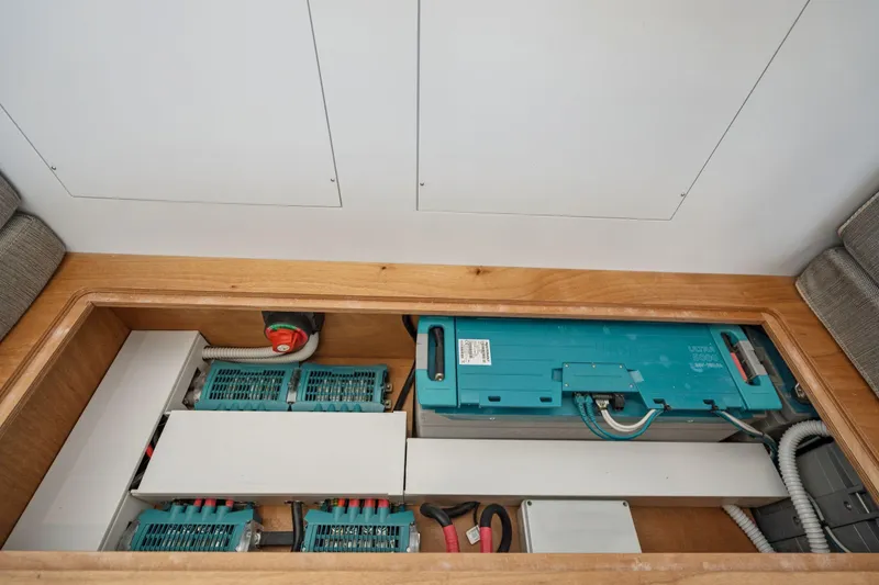 Slide: The Image of Modern kitchen sink on 2019 Itacatamarans 14.99 yacht with sleek black countertop. - 74