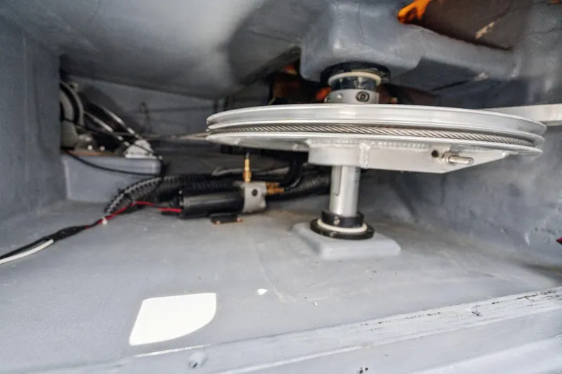 Slide: The Image of Interior of 2019 Itacatamarans 14.99, featuring a modern kitchen with open drawer fridge. - 84