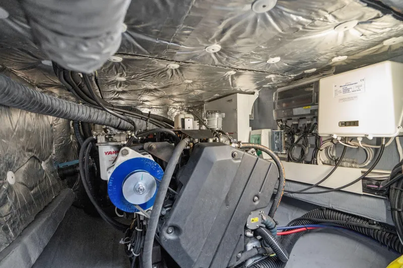 Slide: The Image of Modern interior of 2019 Itacatamarans 14.99 with storage drawer and seating area. - 85