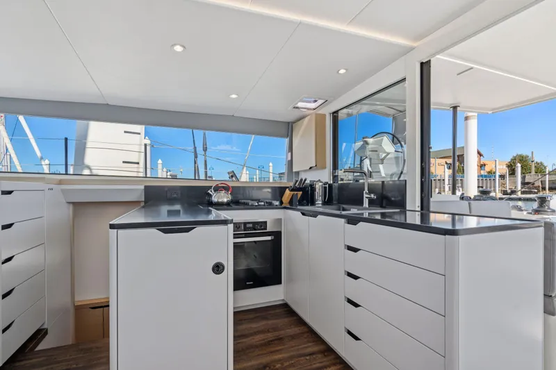 Slide: The Image of Spacious wardrobe and bathroom in 2019 Itacatamarans 14.99 yacht interior. - 96