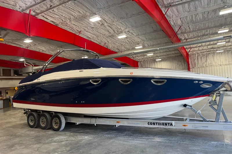 Slide: The Image of 2007 Cobalt 323 boat on trailer in indoor storage facility. - 20