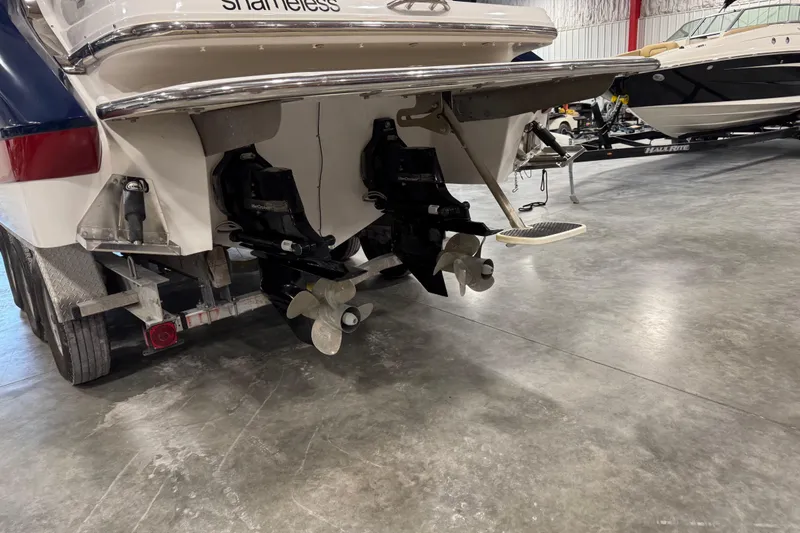 Slide: The Image of 2007 Cobalt 323 boat on trailer, dual propellers, indoor storage. - 5