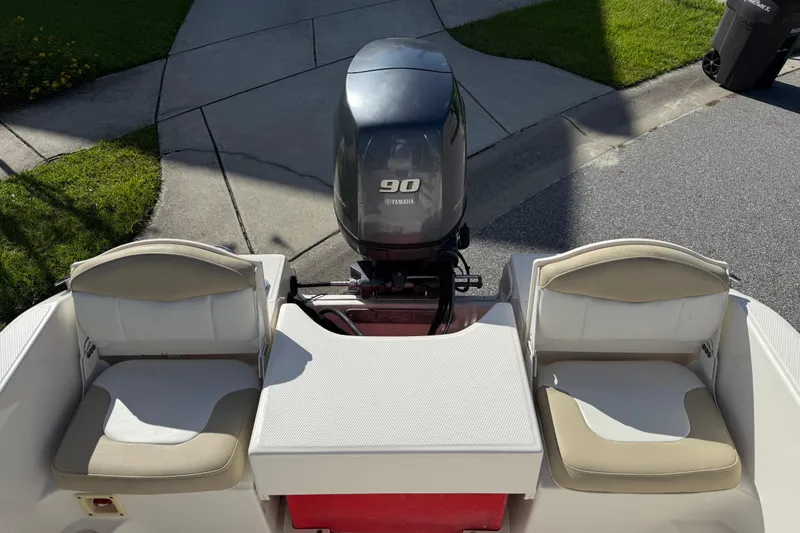 Slide: The Image of 2016 Robalo R160 Center Console boat with Yamaha 90 engine, rear seating view. - 14