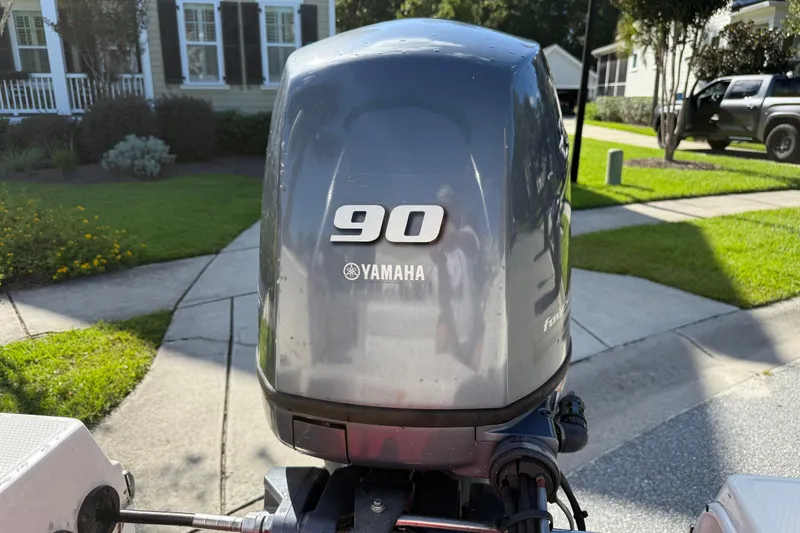 Slide: The Image of Yamaha 90 horsepower outboard motor on 2016 Robalo R160 Center Console boat. - 17