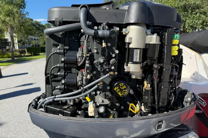 Slide: The Image of 2016 Robalo R160 Center Console boat engine, detailed view of internal components. - 25