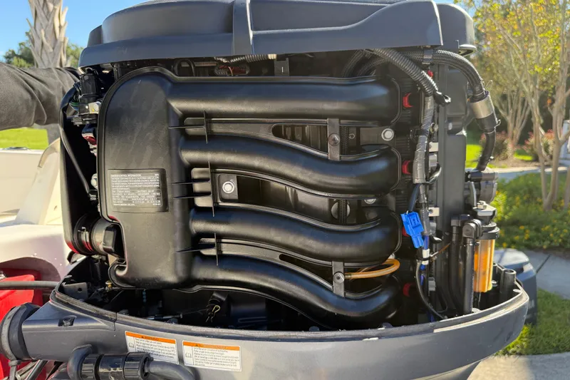Slide: The Image of 2016 Robalo R160 Center Console boat engine, detailed view of components and wiring. - 26