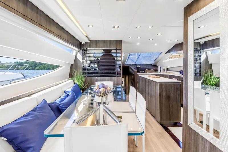 Slide: The Image of Luxurious interior of 2009 Uniesse 65 MY yacht with modern dining area and sleek design. - 12