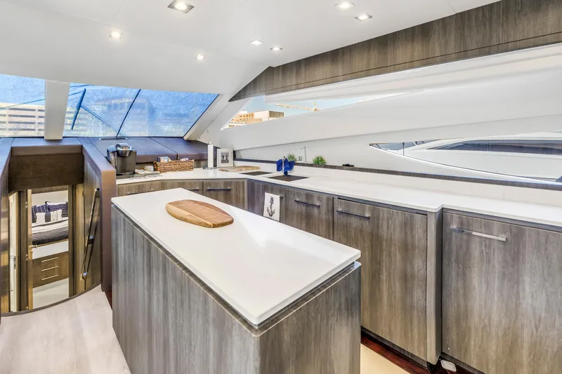 Slide: The Image of Luxurious kitchen interior of 2009 Uniesse 65 MY yacht with modern design elements. - 21