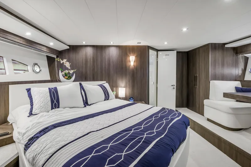 Slide: The Image of Luxurious bedroom interior of 2009 Uniesse 65 MY yacht with modern design and elegant decor. - 41