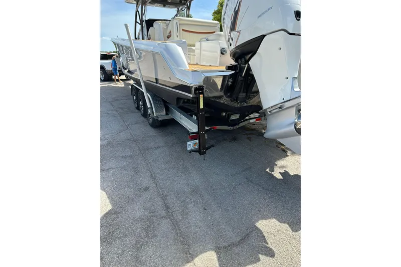 Slide: The Image of 2015 Nor-Tech 390 Sport Center Console boat on trailer, rear view. - 18