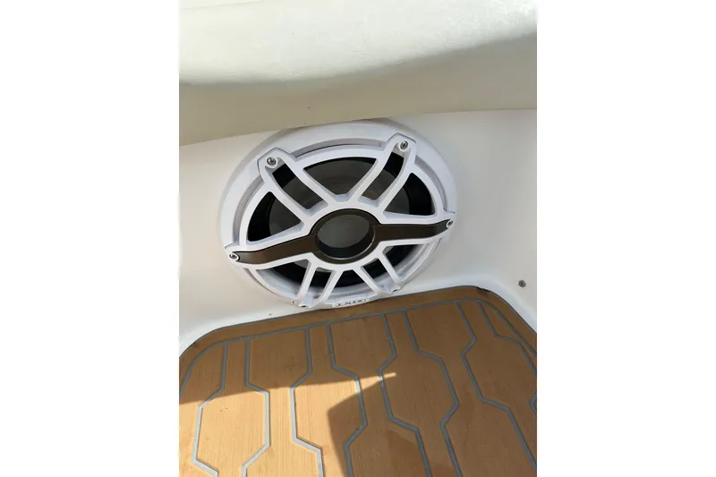 Slide: The Image of Speaker on 2015 Nor-Tech 390 Sport Center Console boat with teak flooring. - 19