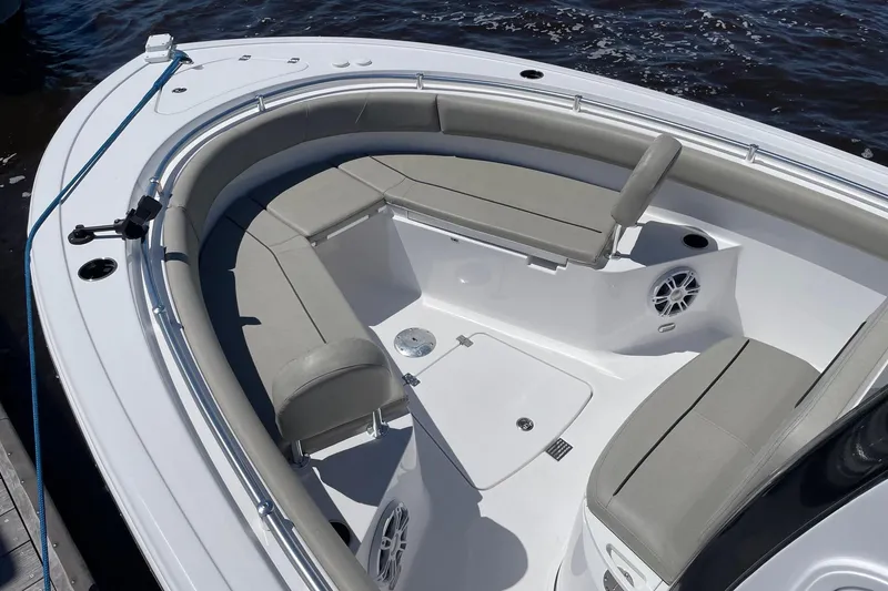 Slide: The Image of 2024 Sportsman Open 232 Center Console boat with spacious seating and modern design. - 14