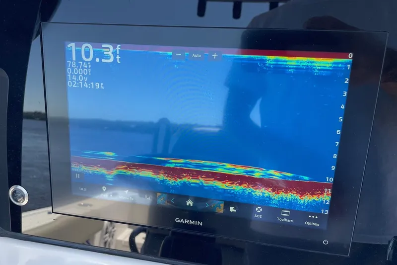 Slide: The Image of Fishfinder display on 2024 Sportsman Open 232 Center Console boat. - 45
