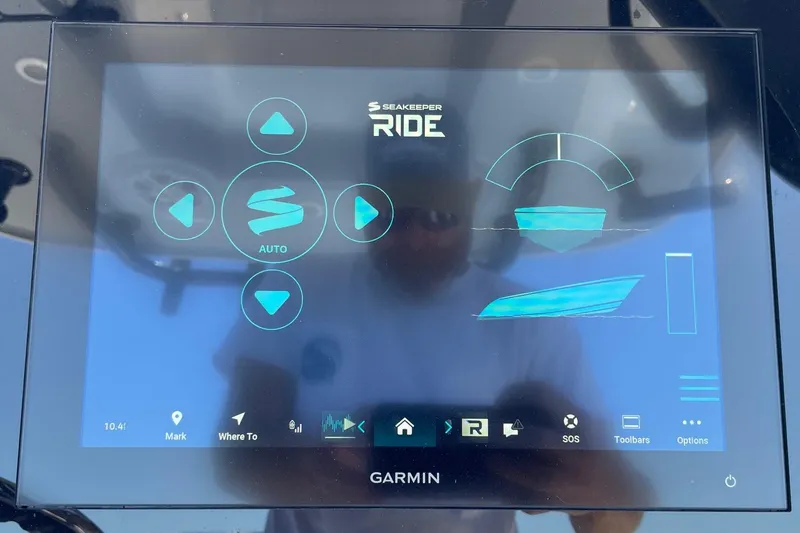 Slide: The Image of Touchscreen display on 2024 Sportsman Open 232 Center Console boat with Seakeeper Ride system. - 50