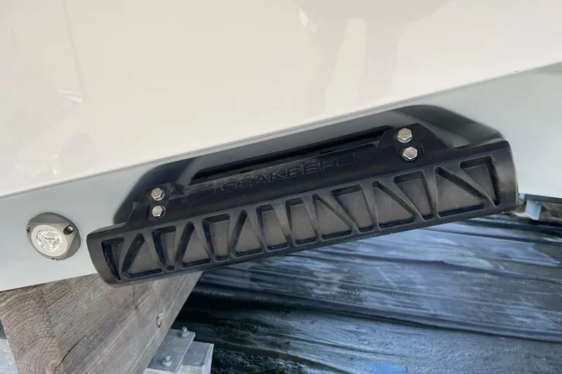 Slide: The Image of 2024 Sportsman Open 232 Center Console boat detail with Seakeeper stabilizer. - 51