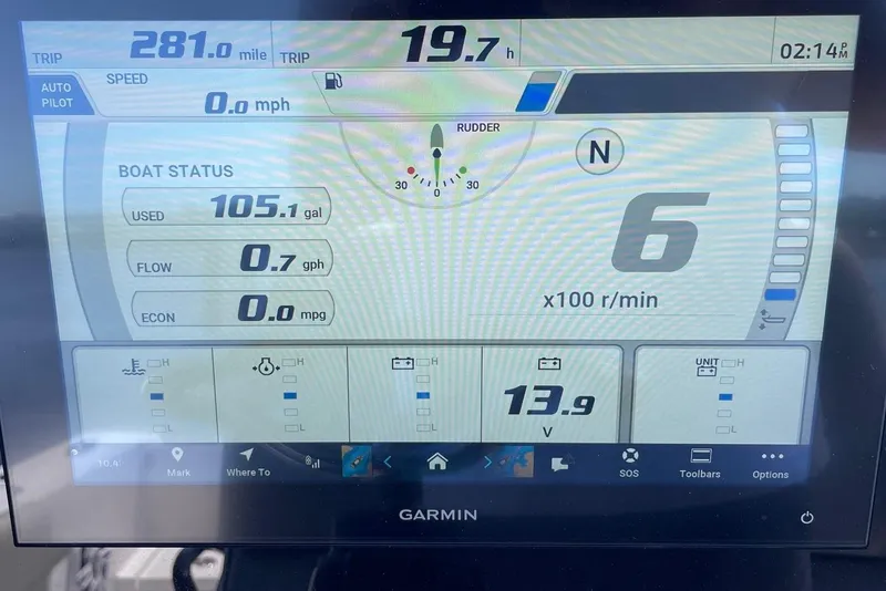 Slide: The Image of Display screen of a 2024 Sportsman Open 232 Center Console boat showing trip and engine data. - 52