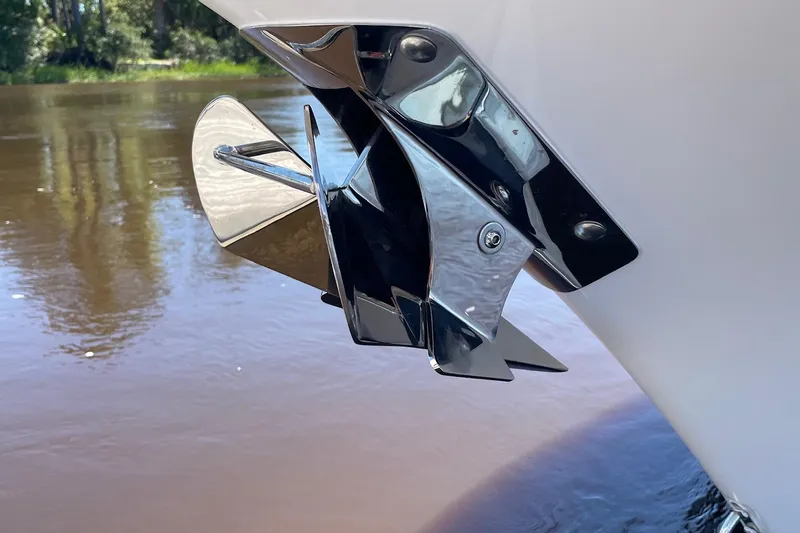 Slide: The Image of 2024 Sportsman Open 232 Center Console boat anchor detail in water. - 56