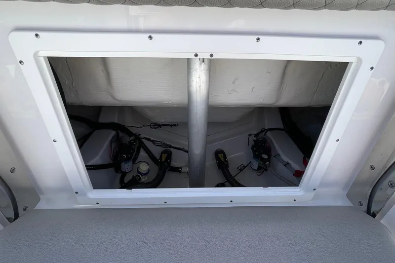 Slide: The Image of 2024 Sportsman Open 232 Center Console boat interior compartment view. - 71