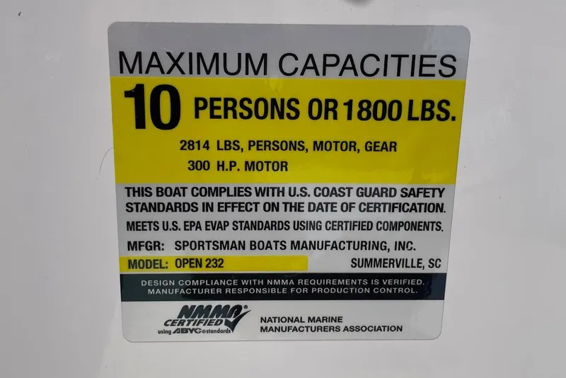 Slide: The Image of 2024 Sportsman Open 232 Center Console capacity label, 10 persons or 1800 lbs, 300 HP motor. - 73