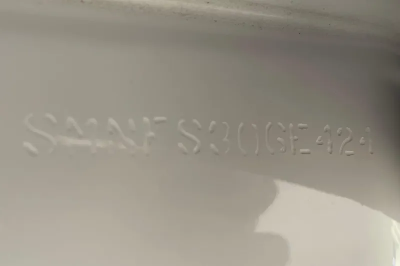 Slide: The Image of 2024 Sportsman Open 232 Center Console hull identification number engraving. - 76