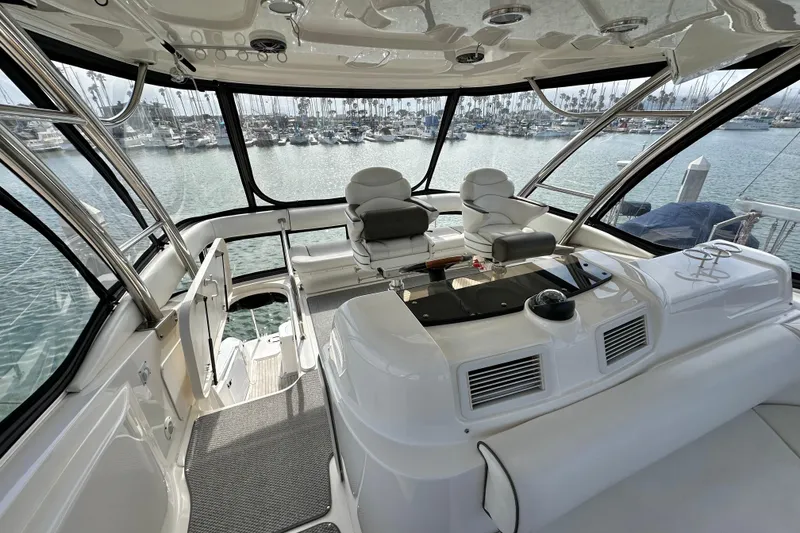 Slide: The Image of 2007 Sea Ray 580 Sedan Bridge yacht interior with marina view. - 9