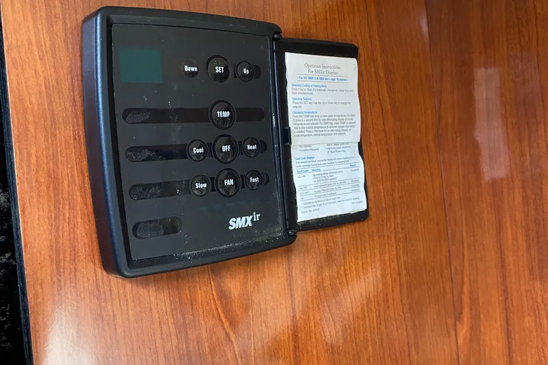 Slide: The Image of Control panel on a 2007 Sea Ray 300 Sundancer boat, featuring SMXir system. - 20