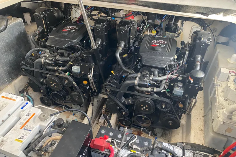 Slide: The Image of Engine compartment of a 2007 Sea Ray 300 Sundancer with dual MerCruiser engines. - 28